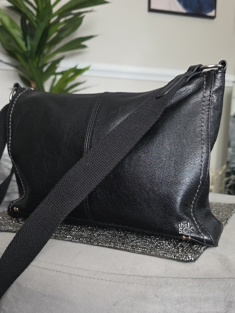 The Sak Black Leather Crossbody Clutch with Web Strap